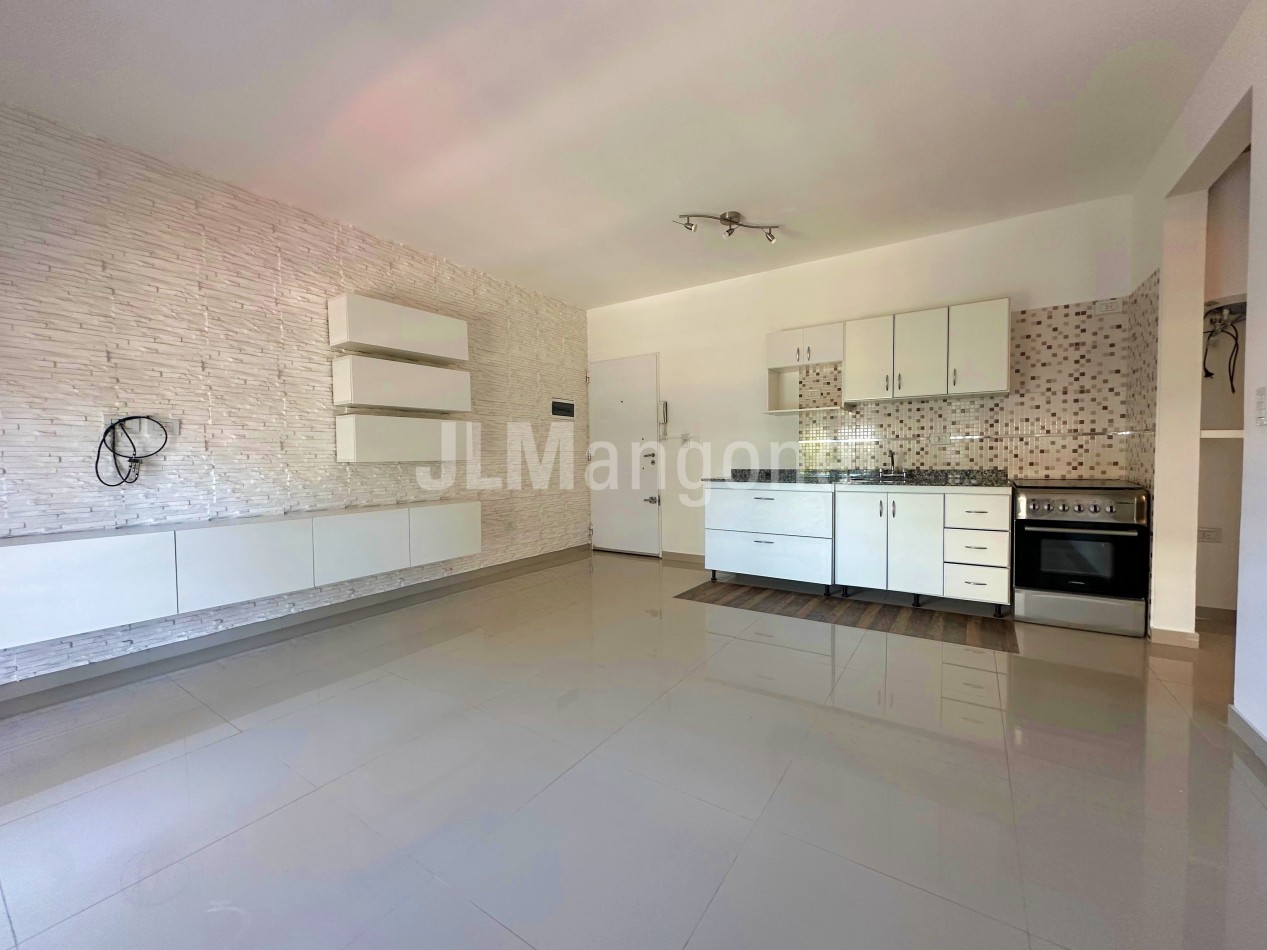 Departamento 2 ambientes con cochera y balcon