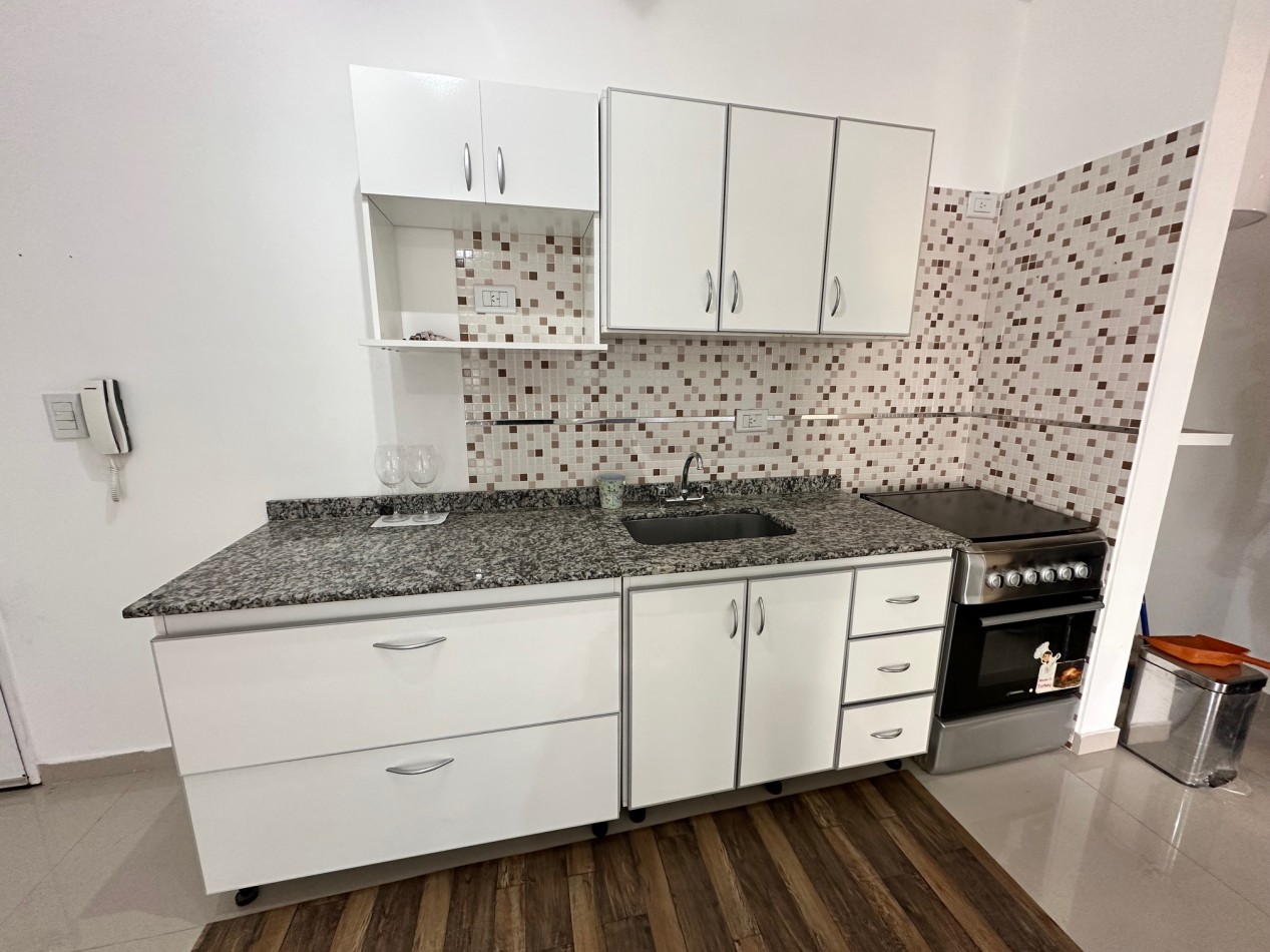 Departamento 2 ambientes con cochera y balcon