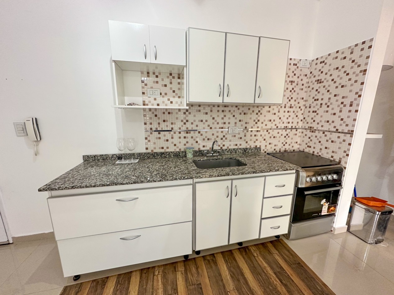 Departamento 2 ambientes con cochera y balcon